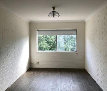 “Great Price, Great Location, Partially Furnished” - Photo 6
