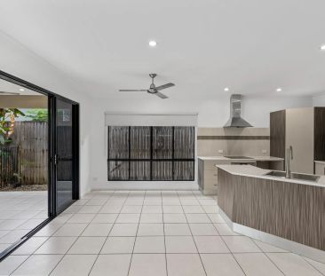 Low maintenance living with private tropical pool. - Photo 6