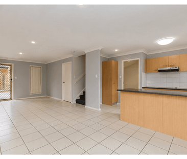 Available Now! Freshly Updated Townhouse with Modern Flooring & Spa... - Photo 1