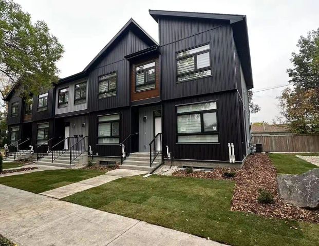 BRAND-NEW 3-BEDROOM MAIN & UPPER UNIT WITH GARAGE - Central AC — 3 Bedrooms Main Floor - Photo 1