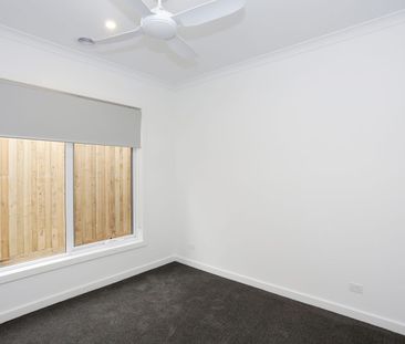 Stunning 4-Bedroom Home in South Morang - Photo 4