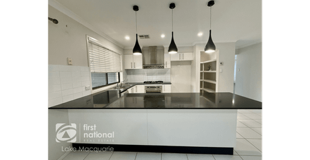 Modern 4-Bedroom Home with Multiple Living Areas - Photo 4