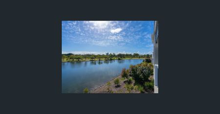 STUNNING WATERFRONT TOWNHOUSE IN EMERALD LAKES - Photo 2