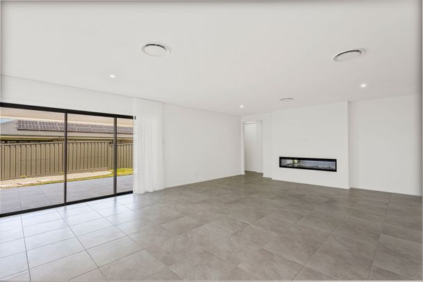 Brand New Luxury Home in Sought After Horsley - Photo 1