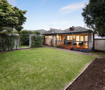 Neat & Tidy 3 Bedroom Home On a "Beach-Side of the Highway" Position! - Photo 1