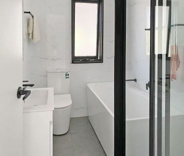 BEAUTIFULLY RENOVATED 4 BEDROOM HOME - Photo 3