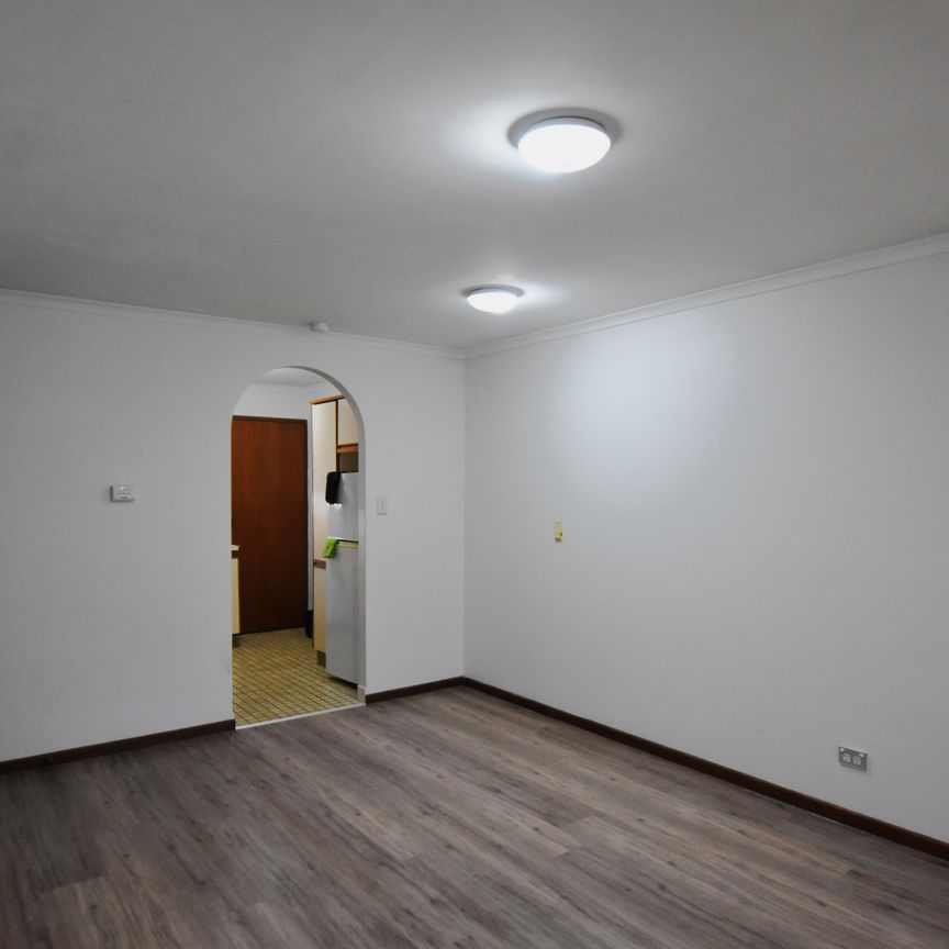 Two Bedroom Unit in an Ideal Location - Photo 1