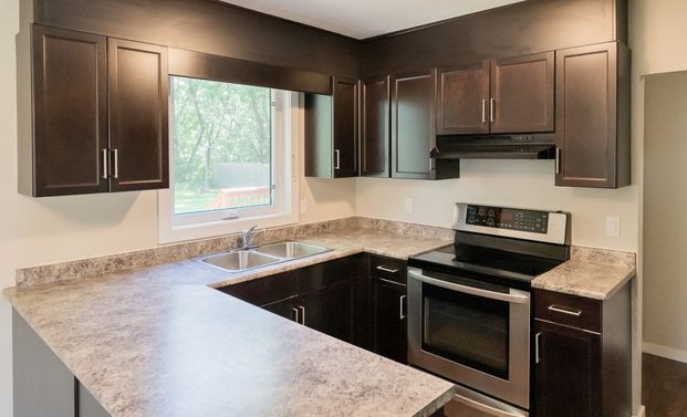 Stunning 3 Bedroom Home with Full Basement - Photo 1