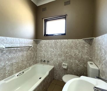 Spacious Unit - Conveniently Located - Photo 3