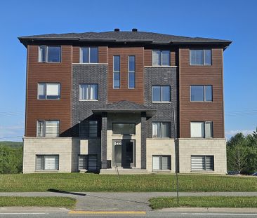 BEAU 5 1/2|THERMOPOMPE|2 STATIONNEMENTS - Photo 2