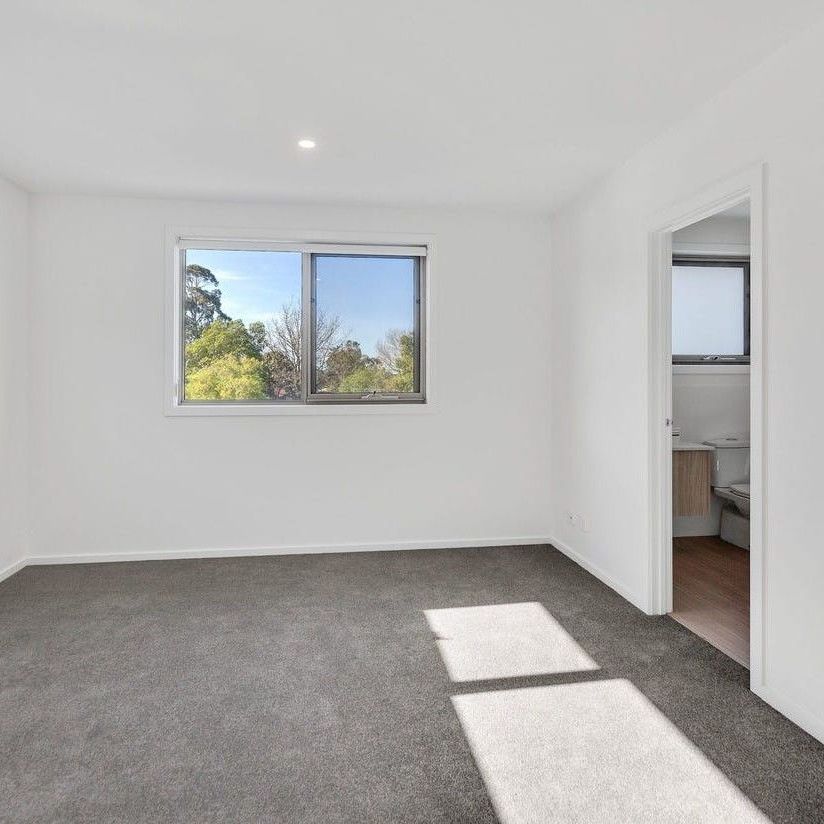 Stylish, Spacious & Ideally Located Townhouse - Photo 1