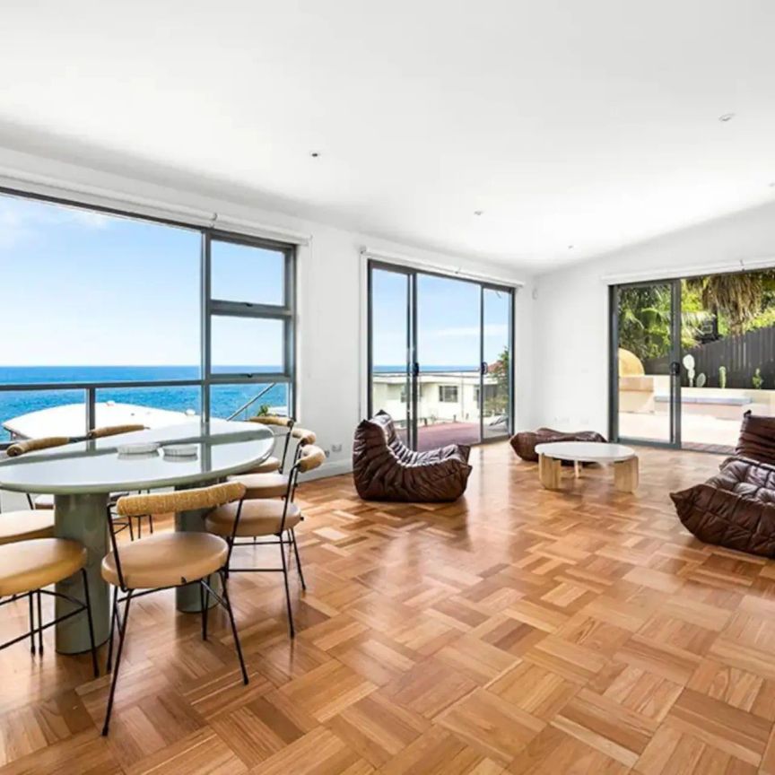 Furnished Coastal Oasis with Panoramic Views and Artistic Flair - Photo 1