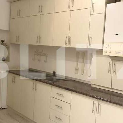 Apartament cu 1 camera, 30 mp, imobil tip casa, mobilat modern, acces gradina - Photo 1