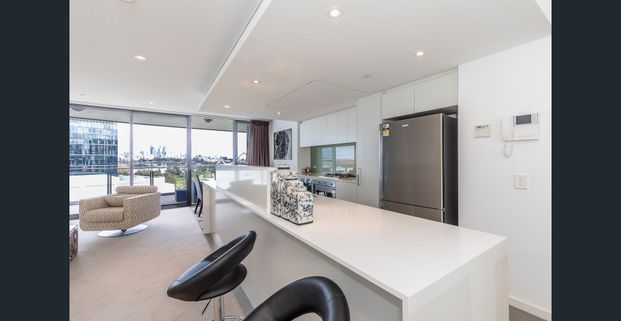 River, Stadium and City Lights – Luxury Furnished Living on the 8th Floor - Photo 1