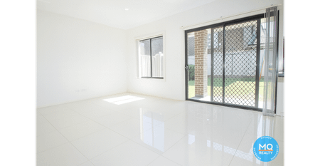 Modern 4-Bedroom Family Home in Prime Girraween Location - Photo 2