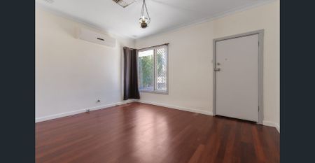 NEAT AND TIDY 4X1 HOME WITH AMPLE PARKING - Photo 3