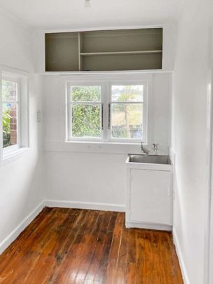 Charming Two-Bedroom Rental in the Heart of Town - Freshly Painted and Move-In Ready! - Photo 1