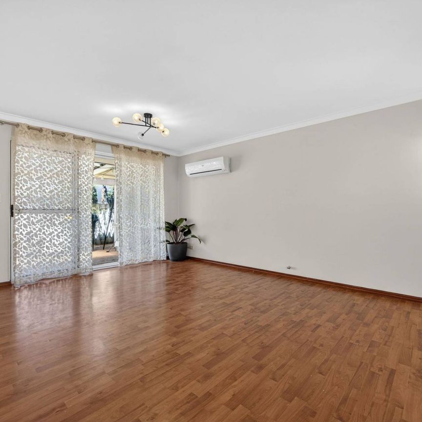 WELL PRESENTED UNIT - 3 BEDROOMS - Photo 1