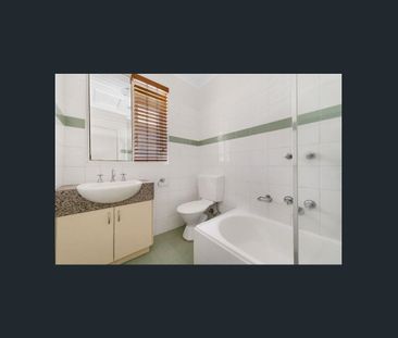 ELEVATED SUNNY TWO BEDROOM APARTMENT! - Photo 5