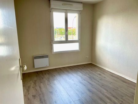 Dans une résidence sécurisée proche du Centre Ville - Photo 2