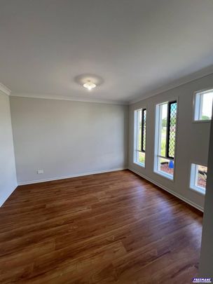 BRAND NEW 3-BEDROOM, 2-BATHROOM HOME - Photo 1