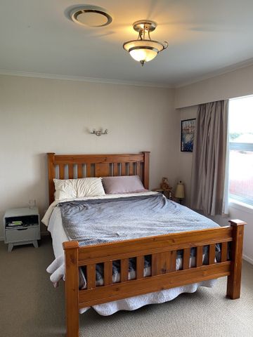 Situated in the desirable Cambridge and positioned perfectly over looking the Milan Park horse stud sits this immaculately presented four bedroom family home. - Photo 2