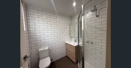 COZY MODERN UNIT WITH LOVELY COURTYARD! - Photo 3