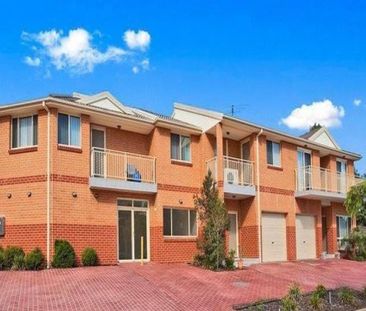 Spacious&comma; Quiet and Well Maintained&comma; This Townhouse is ... - Photo 4
