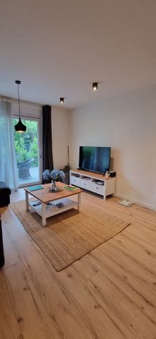 Przestronne mieszkanie z ogrodem i garażem - Photo 3