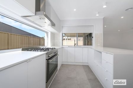 Spacious Family Home with Stylish Comfort - Photo 2