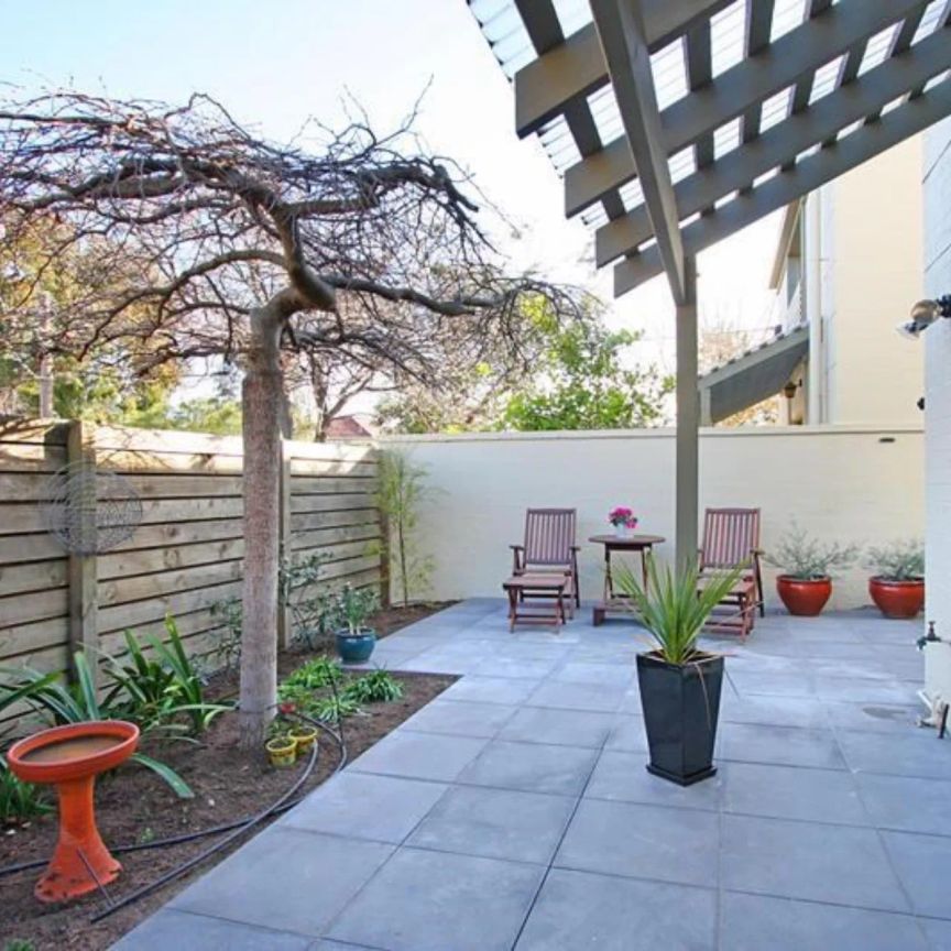 Spacious & Superbly Located Townhouse Living - Photo 1