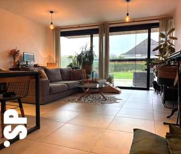 Gelijkvloers nieuwbouwappartement met terras en ruime tuin in het c... - Photo 2
