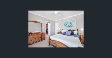 Spacious and stylish, this three-bedroom home offers modern comfort and an unbeatable location just minutes from the coast. - Photo 5