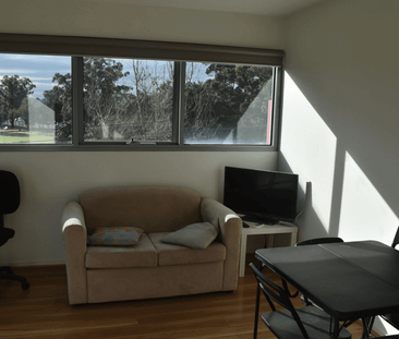 Secure 2-Bedroom Apartment with Cafes, Shops & Transport at Your Do... - Photo 5