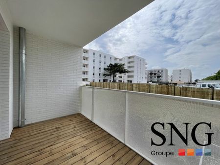 T3 AVEC LOGGIA ET PARKING - Photo 3