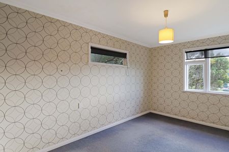 Sunny 3-Bedroom Home with Views in Island Bay - Photo 3