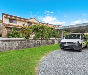Spacious Three-Bedroom Unit in Convenient Location - Photo 2