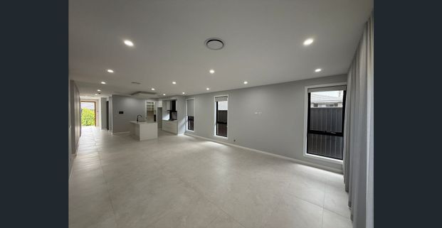 Modern 4 Bedroom Home in the Heart of Austral - Photo 1