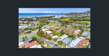 Kick back and relax in this calm, stylish space - Photo 3