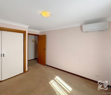 Neat & Tidy Two-Bedroom Unit with Private Courtyard - Photo 3