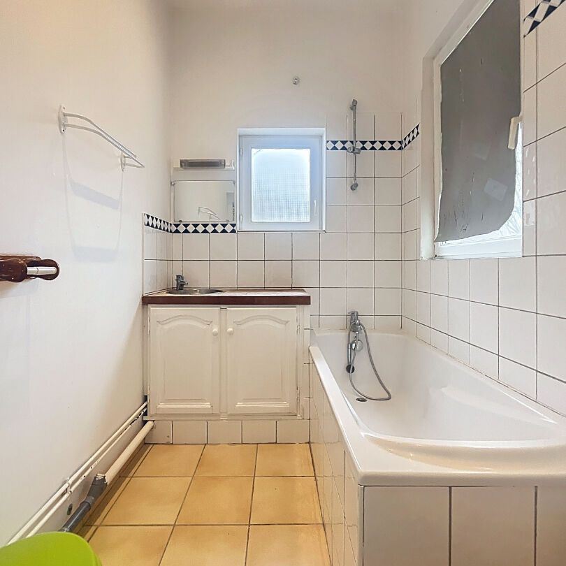 Appartement à louer - REIMS- RUE RUINART DE BRIMONT - Photo 1