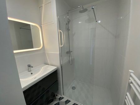 A LOUER APPARTEMENT 2 CHAMBRES PLEIN CENTRE VILLE DE ST QUENTIN 02100 - Photo 5