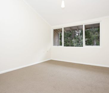 Enjoy the outlook and convenience of this updated townhouse. - Photo 1