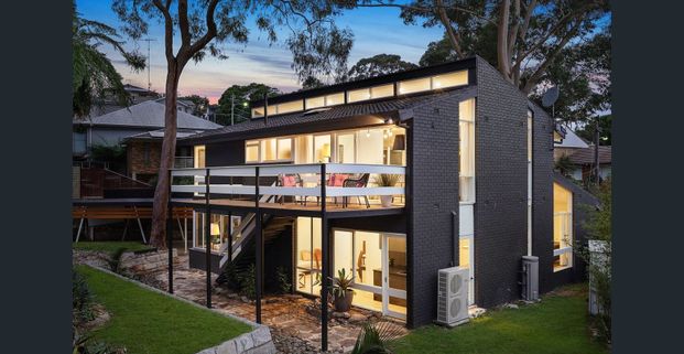 Modern Family Retreat in a Peaceful Setting! - Photo 1