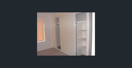 Lowset brick home with side access - Photo 5