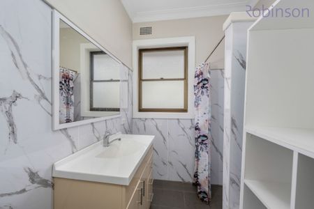Perfectly positioned four bedroom home in a handy central location - Photo 5