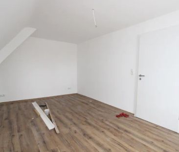 Charmante 3-Zimmer-Dachgeschosswohnung in Kassel-Harleshausen - Photo 1