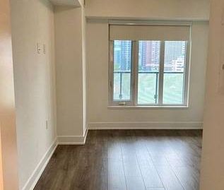 Bloor/Parliament-Luxurious 1Bdrm+Large Den 2Baths - Photo 3