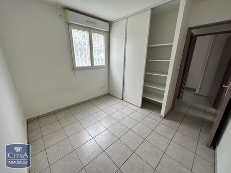 Location Appartement 2 pièces 54m² ST DENIS 97400 - Photo 2