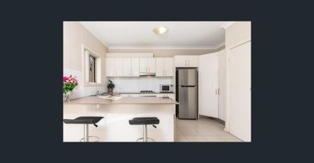 Contemporary 3-Bedroom Townhouse Close to School! - Photo 5